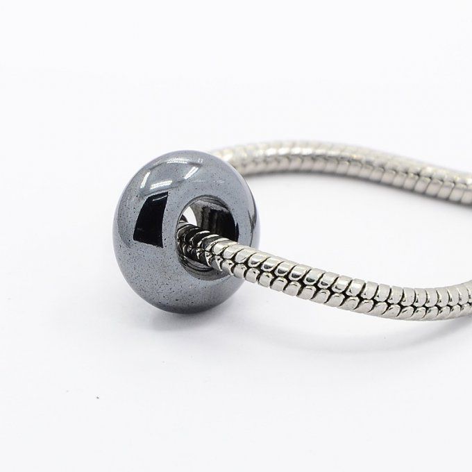 Perle forme abaque en hématite synthétique 15x7mm couleur gris métallique