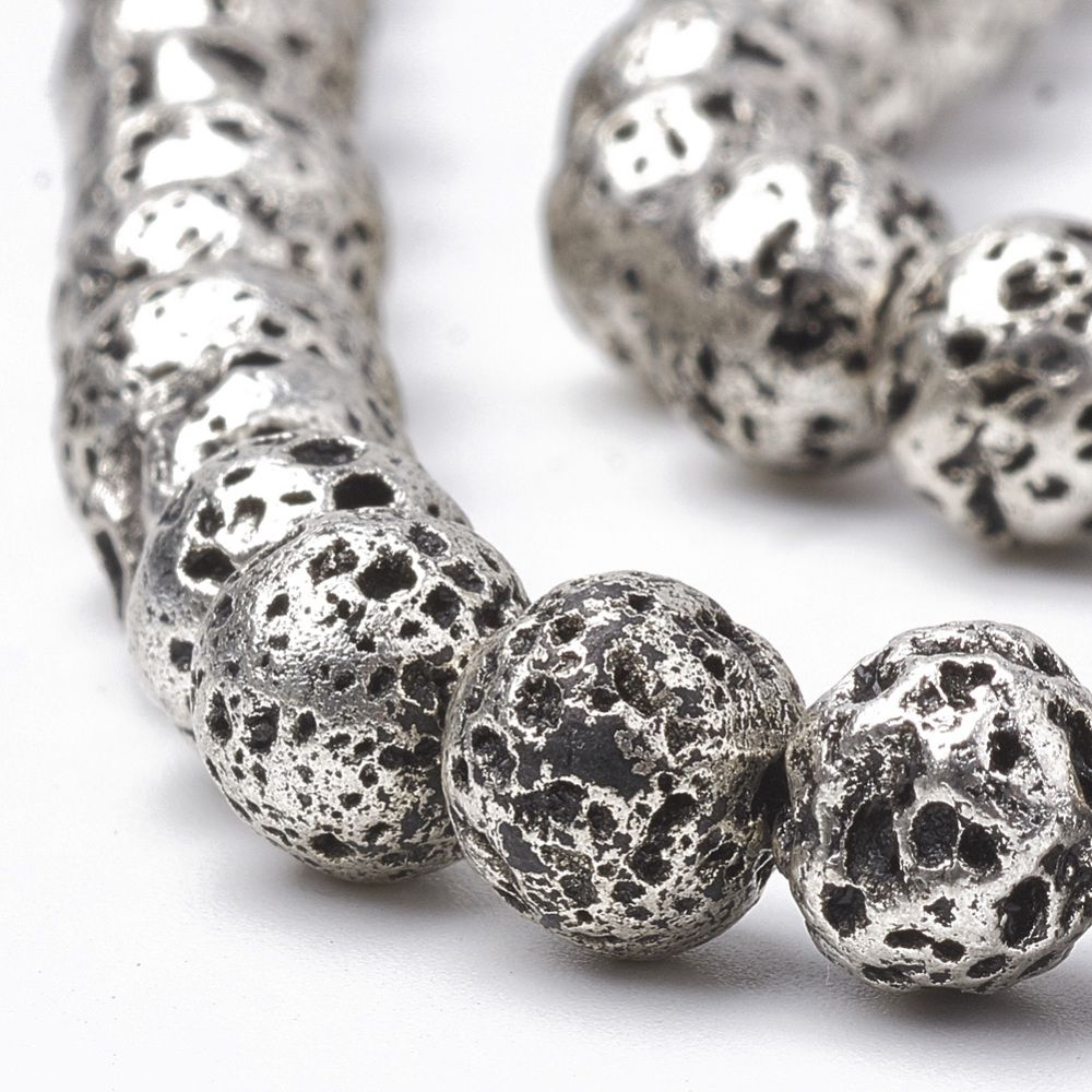 Perle en pierre de lave naturelle, ronde irrégulière 10mm finition gris foncé métallique