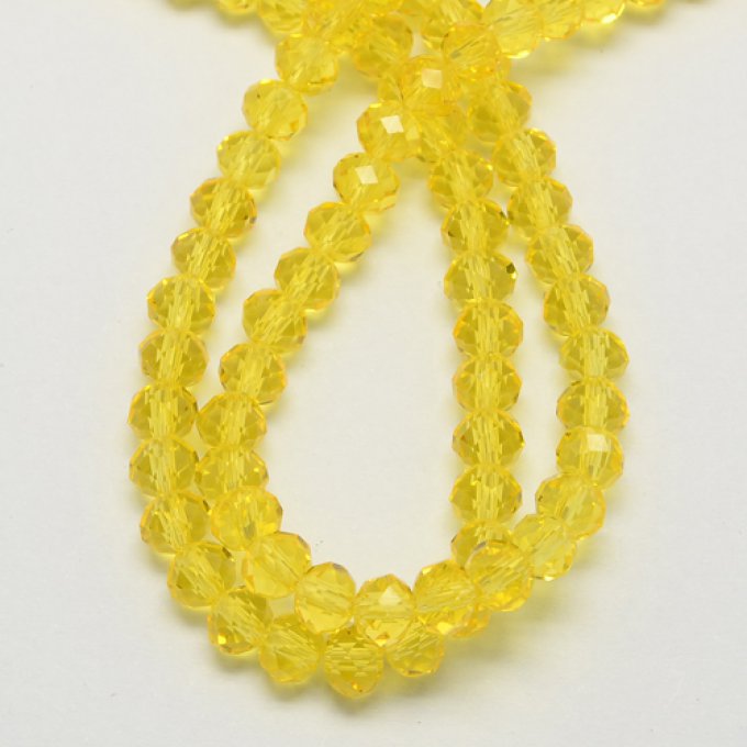 Perles facettées,transparentes,forme d'abaque 6x4mm jaune (x50)