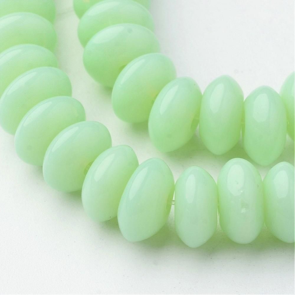 Perle de verre en forme d'abaque 8x4mm coloration vert clair
