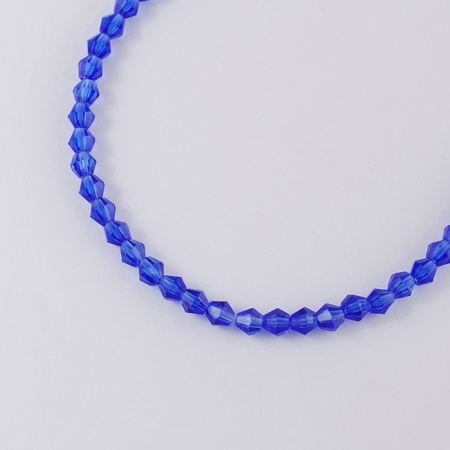 Perles facettées,forme de toupie 4x4mm bleu (x100)