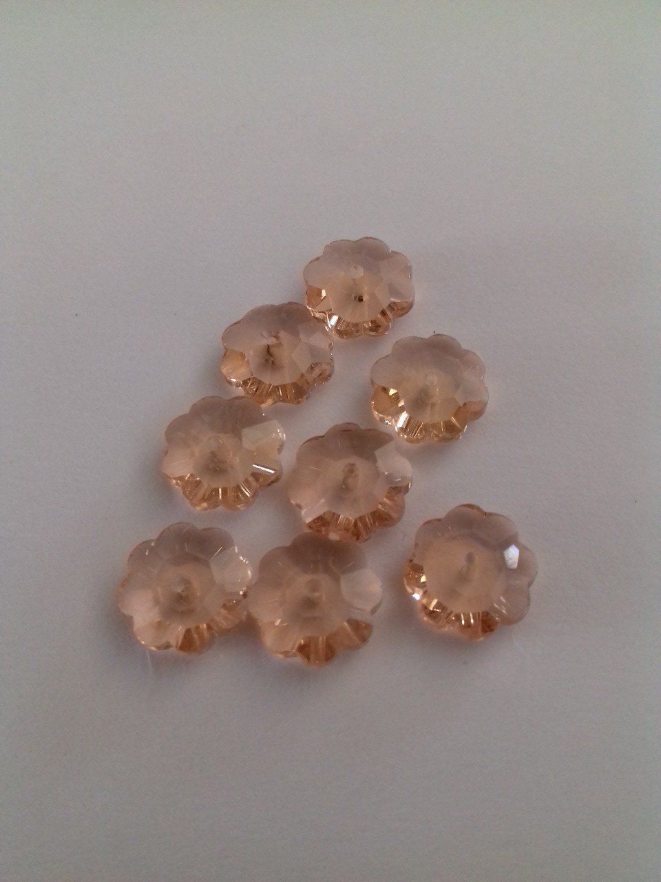 Perle de verre facettée forme marguerite 9.5-10x4mm couleur vieux rose foncé