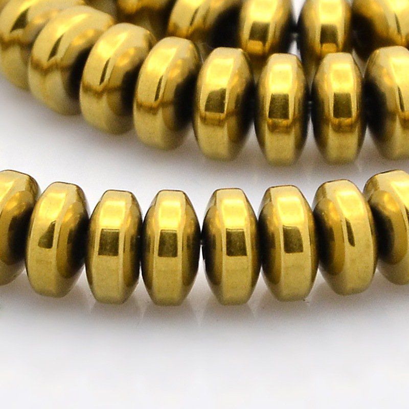 Perles forme abaque en hématite synthétique 6x3mm couleur or métallique (x10)