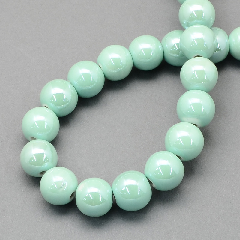 Perles porcelaine nacrée  Ø 6 mm  aigue-marine