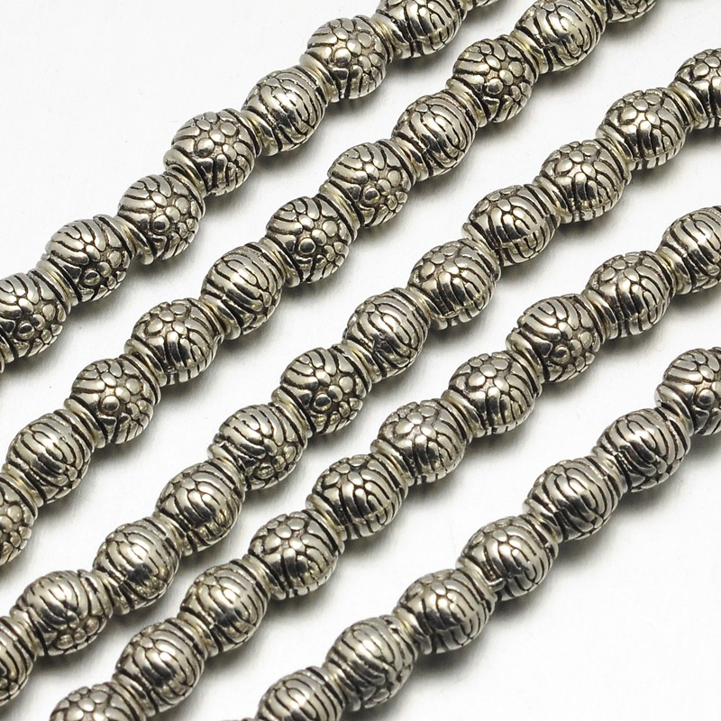 Perles métalliques Ø6mm forme tambour  (x10)