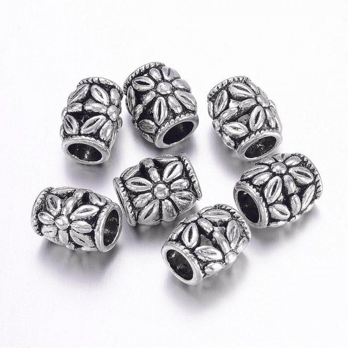 Perle  métallique forme tonneau motif fleur  Ø10x11mm couleur argent