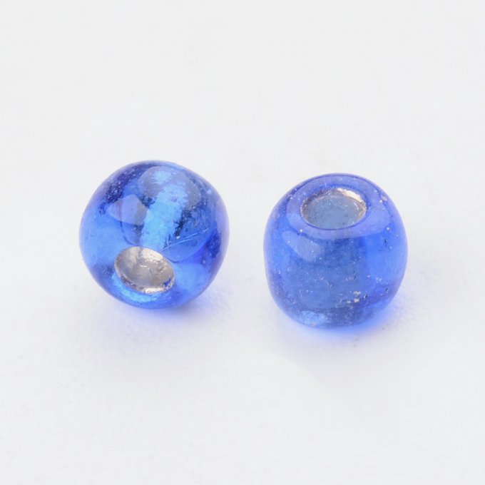 Rocaille 4mm,transparente,trou argenté, bleu (20g)