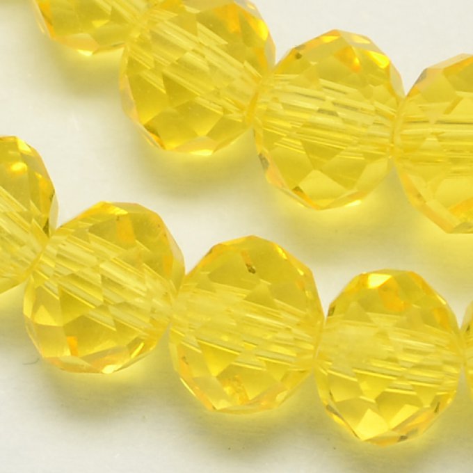 Perles facettées,transparentes,forme d'abaque 6x4mm jaune (x50)