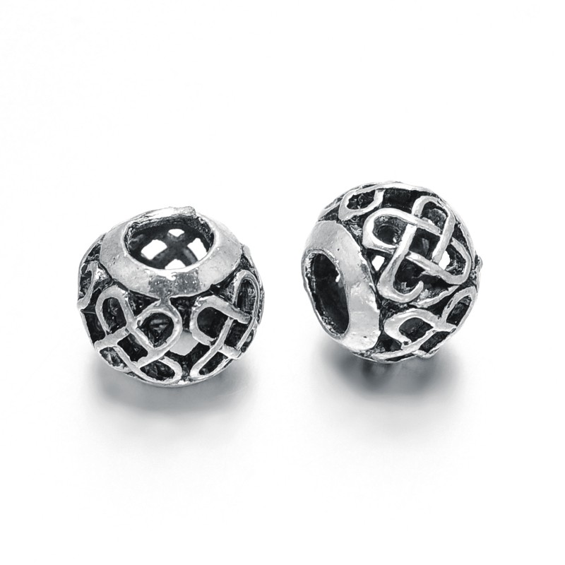Perle  métallique forme sphère creuse Ø11x9mm