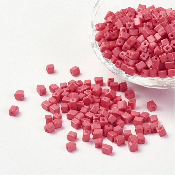 Perles de rocaille opaques  "cubiques"  3-7x3-4x3-4mm  corailclair (20g) 