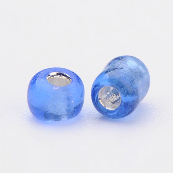 Rocaille transp   3mm,trou argenté, bleu roi (20g)