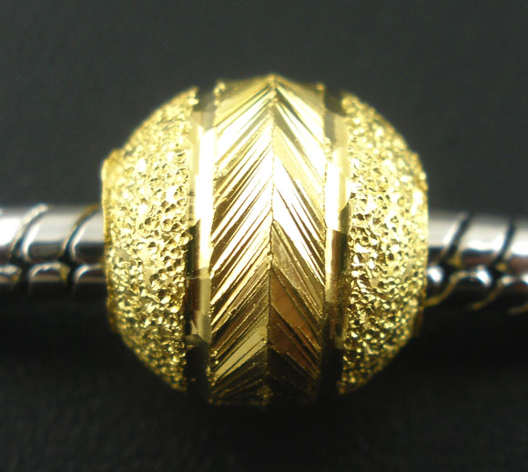 Perle métallique forme ovoïde, cuivre doré