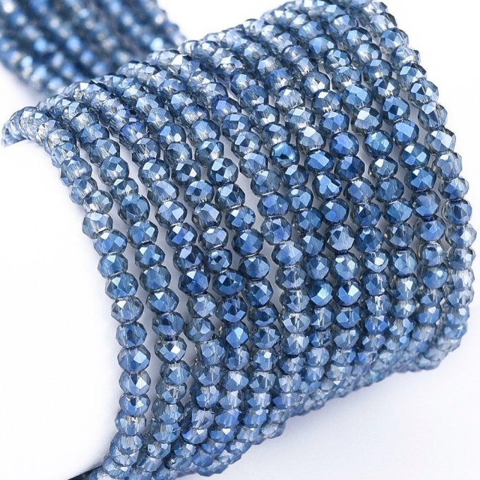 Perles facettées,forme  rondelle  2x1.5mm reflet arc en ciel couleur bleu marine  (1 chapelet)