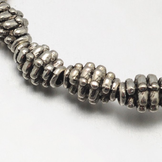 Perles métalliques Ø7mm forme ovale  (x10)
