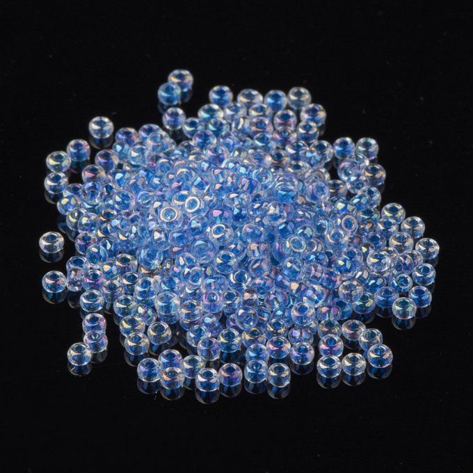 Rocaille ronde transparente  11/0  2.3x1.5mm trou coloré / bleu  (20g) 