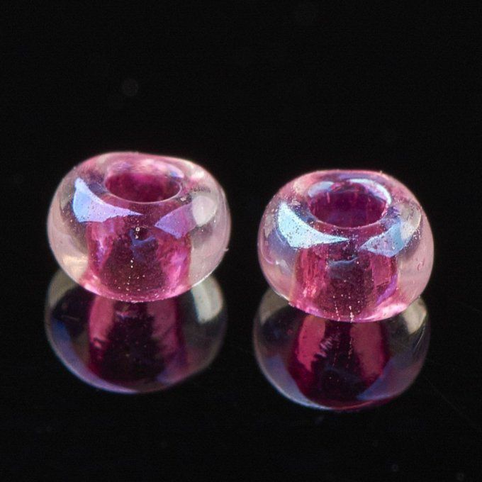 Rocaille ronde transparente  11/0  2.3x1.5mm trou coloré / rose vif  (20g) 