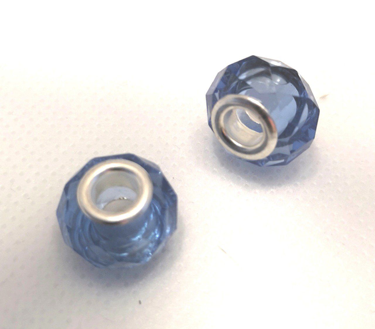 Perle Européenne en verre facetté Ø14x10mm cristal bleu 