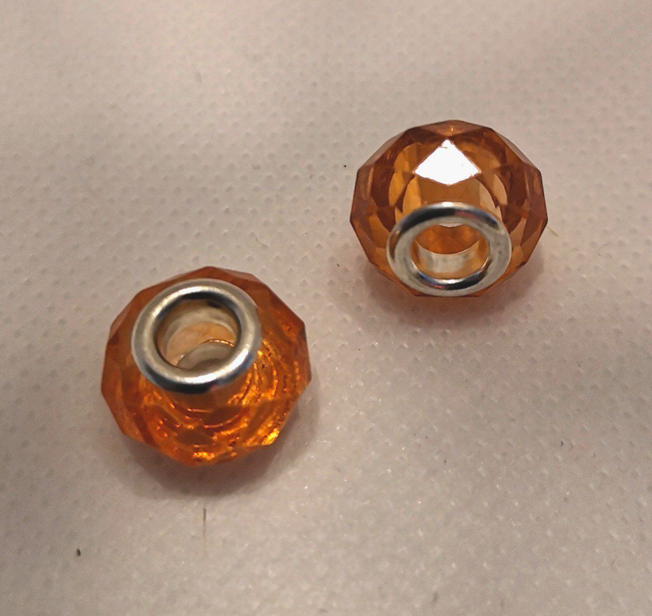 Perle Européenne en verre facetté Ø14x10mm cristal orange