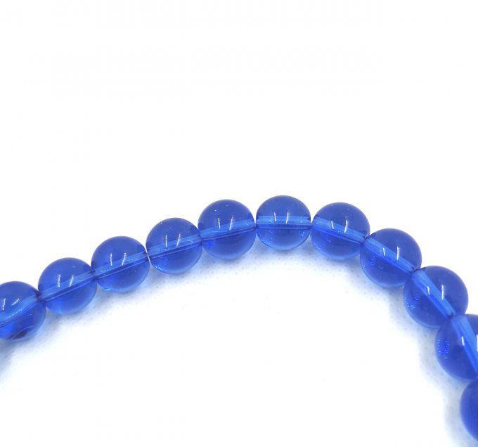 Perles de verre rondes  transparentes  diamètre 10mm couleur bleue (x10)