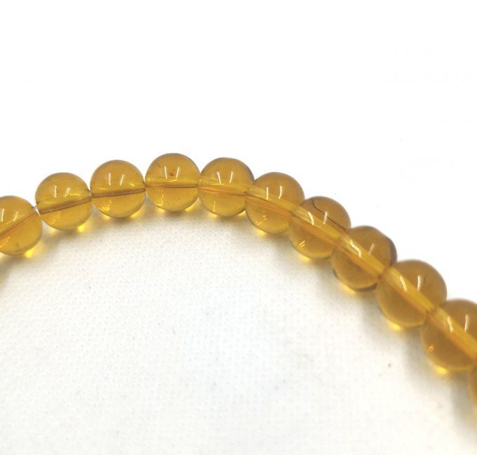 Perles de verre rondes  transparentes  diamètre 10mm couleur or  (x10) 