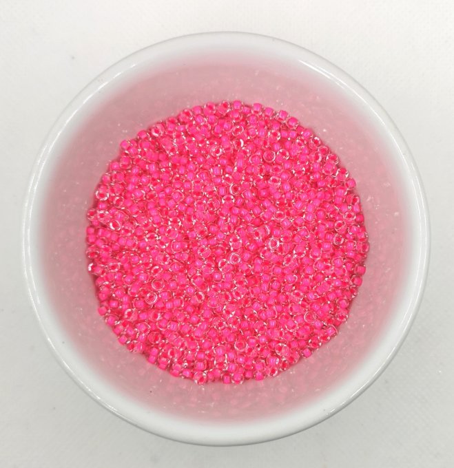 Perles de rocaille Matubo  8/0  3.1x2.10mm Crystal pink neon lined (x10g) 