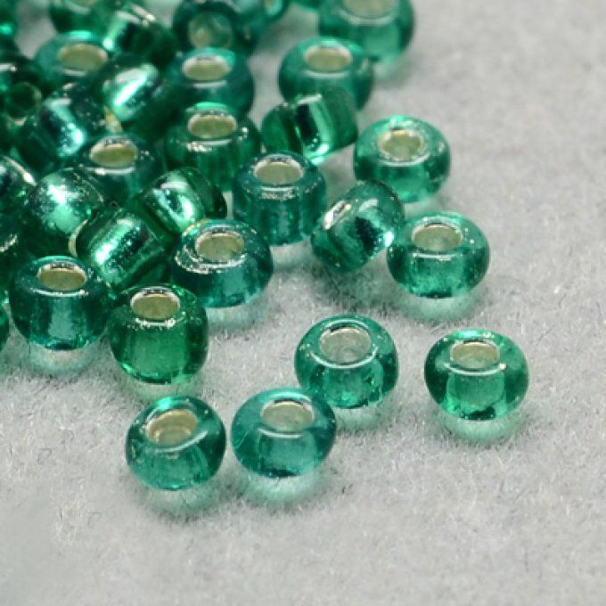 Rocaille ronde (grade a)  4x3mm transparente ,trou argenté,  couleur vert de mer (20g) 