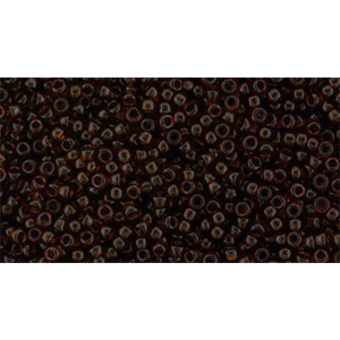 Rocaille  ronde Toho taille 15/0    Transparent Smoky Topaz  (x10g)